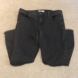 Free people - mid rise black jeans- distressed knee - great shape